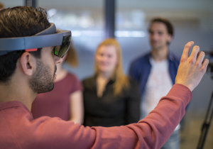 An example of XR in academia: a student uses the HoloLens for a medical XR experience